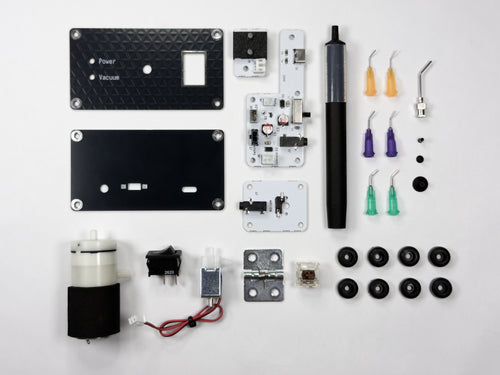 MiniPic: Benchtop Vacuum Tweezers